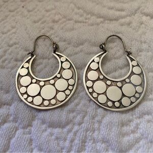 Sterling silver earrings with dot motif.